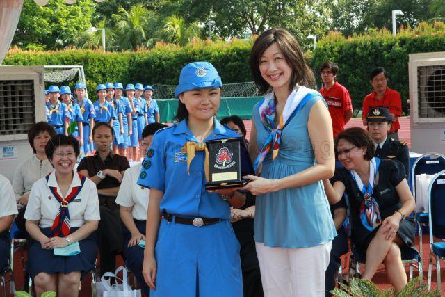 President of Girl Guides Singapore Mrs Joy Balakrishnan, wife of Minister for Community Development, Youth and Sports Dr Vivian Balakrishnan, presenting Puan Noor Aishah (PNA) gold awards for Guide Units during Girl Guides centenary celebrations at Bishan Sports Stadium located at No. 7 Bishan Street 14
