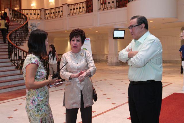 Chairman Gerard Ee and NKF Chief Executive Officer Mrs Eunice Tay of National Kidney Foundation (NKF) with official at Orchid Country Club during NKF's 100-table charity dinner