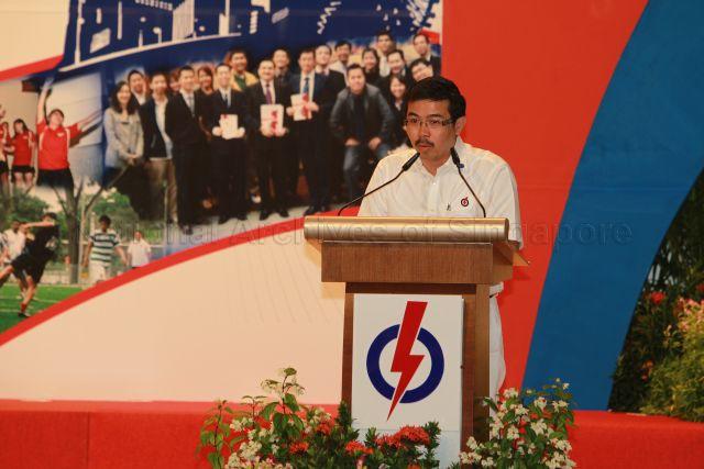 National Trades Union Congress (NTUC)'s Director of Unit for Contract and Casual Workers and People's Action Party (PAP) candidate for Pasir Ris-Punggol Group Representation Constituency (GRC) in the forthcoming general election Zainal Sapari speaking at 25th Anniversary Rally of Young PAP (YP) held at NTUC Centre auditorium in Marina Boulevard