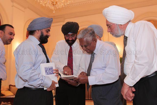 President S R Nathan with (from left) Member of Parliament for Ang Mo Kio Group Representation Constituency (GRC) Inderjit Singh, Chairman of Sikh Welfare Council (SIWEC) Jagjit Singh and Mr Dilbagh Singh at the reception during presentation ceremony of autographed copies of his book "Winning against the odds" to 17 SIWEC members at Istana. The 17 members each bought an autographed copy for $10,000 to raise funds for the needy.