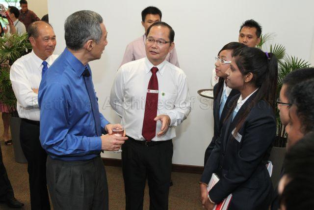 Prime Minister Lee Hsien Loong with Principal of Institute of Technical Education (ITE) College West Dr Yek Tiew Ming and students at the reception during official opening of ITE College West at 1 Choa Chu Kang Grove