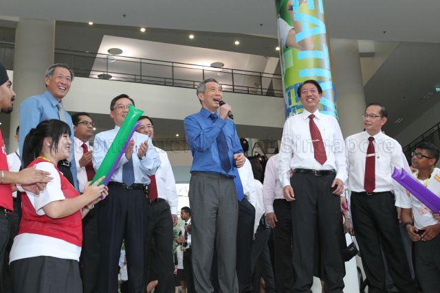 Prime Minister Lee Hsien Loong speaking to students at the event plaza during official opening of Institute of Technical Education (ITE) College West at 1 Choa Chu Kang Grove. Also present are Deputy Prime Minister and Minister for Defence Teo Chee Hean (right), Minister for Manpower Gan Kim Yong and Minister for Education and Second Minister for Defence Dr Ng Eng Hen.