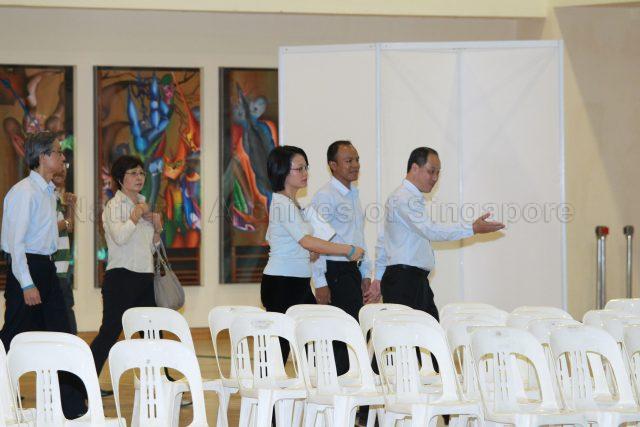 General Election 2011 - Workers' Party (WP) candidates for Aljunied Group Representation Constituency (GRC) Low Thia Kiang (right), Muhamad Faisal bin Abdul Manap, Ms Sylvia Lim and Chen Show Mao (left) at Deyi Secondary School in Ang Mo Kio Street 42, the nomination centre for electoral divisions of Ang Mo Kio, Aljunied, Bishan-Toa Payoh and Sengkang West