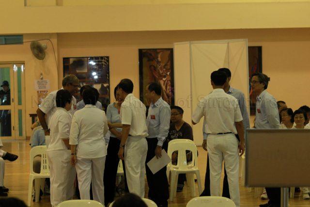General Election 2011 - Candidates of People's Action Party (PAP) and Workers' Party (WP) for Aljunied Group Representation Constituency (GRC) at Deyi Secondary School in Ang Mo Kio Street 42, the nomination centre for electoral divisions of Ang Mo Kio, Aljunied, Bishan-Toa Payoh and Sengkang West