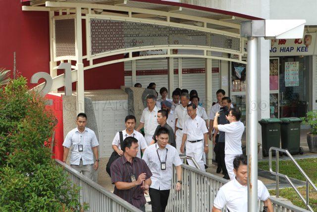 General Election 2100 - Prime Minister Lee Hsien Loong with fellow People's Action Party (PAP) candidates for Ang Mo Kio Group Representation Constituency (GRC) and Bishan-Toa Payoh GRC and supporters making their way to Deyi Secondary School in Ang Mo Kio Street 42, the nomination centre for electoral divisions of Ang Mo Kio, Aljunied, Bishan-Toa Payoh and Sengkang West
