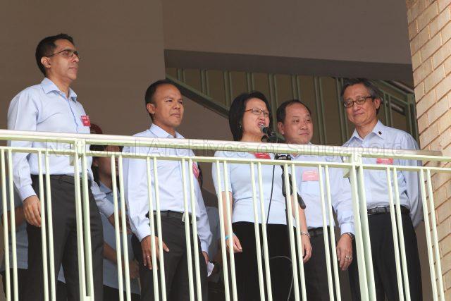 General Election 2011 - Workers' Party (WP) candidate for Aljunied Group Representation Constituency (GRC) Ms Sylvia Lim addressing supporters at Deyi Secondary School in Ang Mo Kio Street 42, the nomination centre for electoral divisions of Ang Mo Kio, Aljunied, Bishan-Toa Payoh and Sengkang West. With her are fellow WP candidates for Aljunied GRC (from left) Pritam Singh, Muhamad Faisal bin Abdul Manap, Low Thia Kiang and Chen Show Mao.