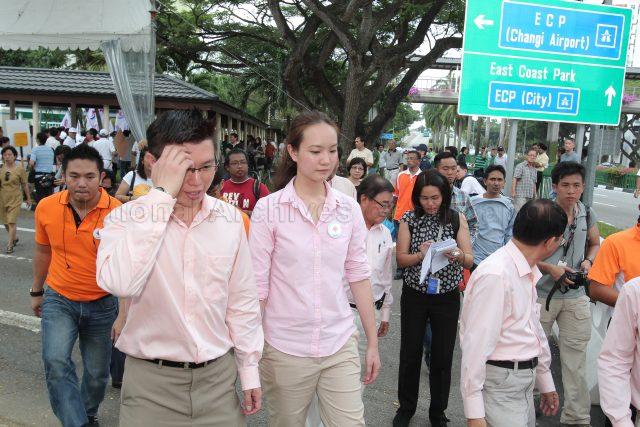 General Election 2011 - National Solidarity Party (NSP) candidates for Marine Parade Group Representation Constituency (GRC) Ms Nicole Seah and Spencer Ng Chung Hon at the street along Tao Nan School, 49 Marine Crescent, the nomination centre for electoral divisions of Marine Parade GRC, Potong Pasir, Joo Chiat and Mountbatten