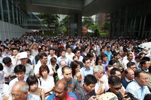 The crowd attending People's Action Party (PAP) lunchtime election rally at UOB Plaza in the heart of financial district