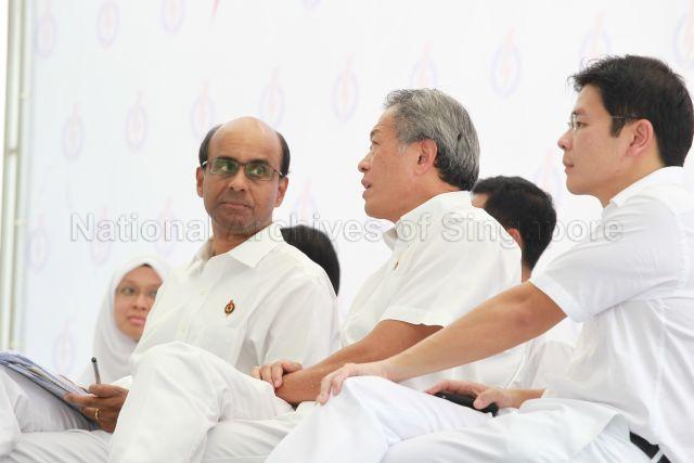 People's Action Party (PAP) candidate for West Coast Group Representation Constituency (GRC) Lawrence Wong, PAP candidate for Bishan-Toa Payoh GRC Dr Ng Eng Hen and PAP candidate for Jurong GRC Tharman Shanmugaratnam at PAP lunchtime election rally held at Boat Quay next to UOB Plaza