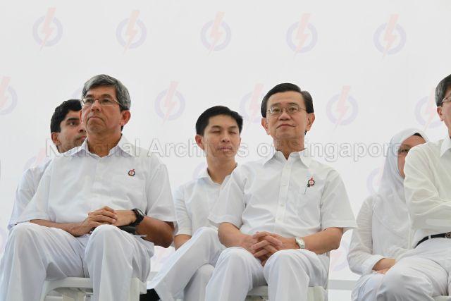 People's Action Party (PAP) candidate for Bishan-Toa Payoh Group Representation Constituency (GRC) Wong Kan Seng and PAP candidate for Moulmein-Kallang GRC Associate Professor Dr Yaacob Ibrahim at PAP lunchtime election rally held at Boat Quay next to UOB Plaza. Behind them are other PAP candidates (from left) Vikram Nair, Brigadier-General Tan Chuan-Jin and Dr Intan Azura Mokhtar.