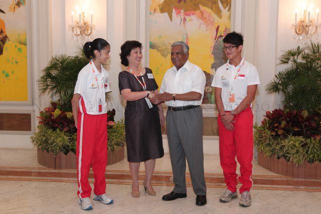President S R Nathan with Singapore's chef de mission Mrs Kelvyna Chan and athletes during courtesy call by twenty-one athletes and officials from seven participating nations of third ASEAN Schools Games at Istana