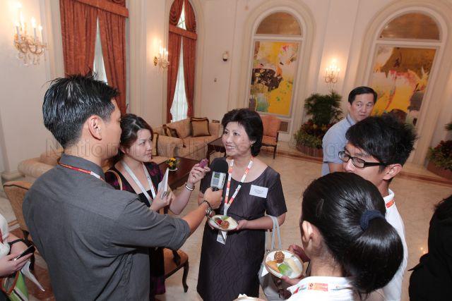 Chef de mission Mrs Kelvyna Chan of Singapore speaking to the media during courtesy call on President S R Nathan by twenty-one athletes and officials from seven participating nations of third ASEAN Schools Games at Istana