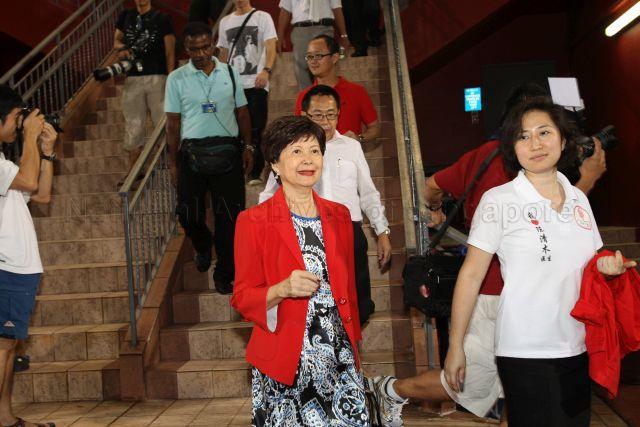 Mrs Cecilia Tan and Tan Ming Li, wife and daughter of presidential candidate Dr Tan Cheng Bock, at Jurong East Stadium to wait for the presidential election result
