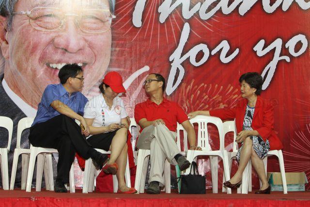 Family members of presidential candidate Dr Tan Cheng Bock, (from right) wife Mrs Cecilia Tan, son Joshua Tan, daughter Tan Ming Li at Jurong East Stadium to wait for the presidential election result 