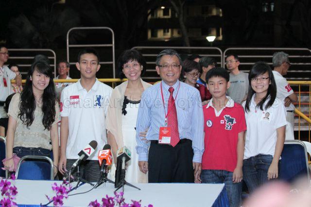 Presidential candidate Tan Jee Say and his family members waiting for the presidential election result at Bedok Stadium. Mr Tan's wife Madam Patricia Khoo (with shawl) and children (from right) Sarah, Andrew, Joseph and Anne.