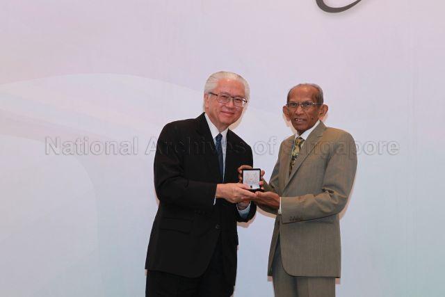 Taken at: National Arts Council (NAC)'s Arts Awards 2011 Presentation Ceremony at Istana Banquet Hall Pictured: Guest-of-Honour President Tony Tan and Cultural Medallion recipient Yusnor Ef