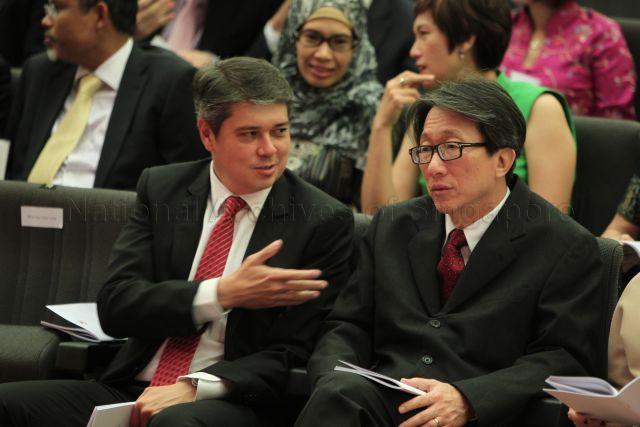 Speaker of Parliament Michael Palmer and Minister (Prime Minister's Office) Lim Swee Say attending investiture of National Day awards at University Cultural Centre Hall, National University of Singapore in Kent Ridge