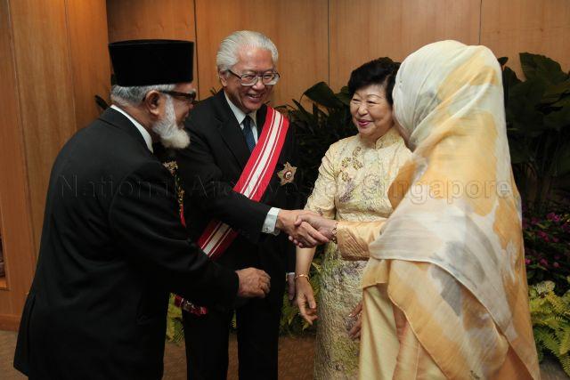 Isa Syed President and Mrs Tony Tan Keng Yam greeting recipient of