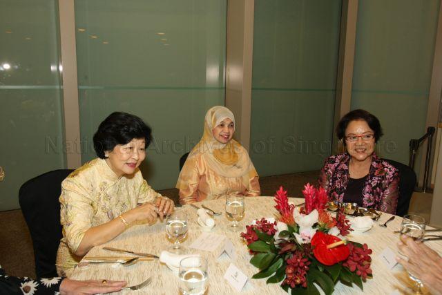 Mrs Mary Tan, wife of President Tony Tan Keng Yam, with Mrs Koh Choon Hui, wife of Chairman of Singapore Children's Society and recipient of Meritorious Service Medal, and Mrs Syed Isa, wife of former Mufti of Singapore and recipient of Meritorious Service Medal, at the reception during investiture of National Day awards at University Cultural Centre, National University of Singapore in Kent Ridge