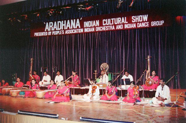 Aradhana Indian Cultural Show at World Trade Centre Auditorium - Indian classical music performance on stage.