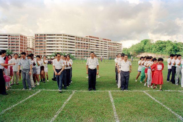 Ministerial Walkabout at Bukit Gombak Constituency - Minister for Trade and Industry Lee Hsien Loong participating in a game, accompanied by Minister of State for Education and Community Development Dr. Seet Ai Mee, and Member of Parliament Ng Pock Too.