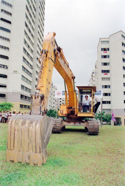 New Bukit Batok Community Club Ground Breaking Ceremony - Member of Parliament Ong Chit Chung operating the excavator.