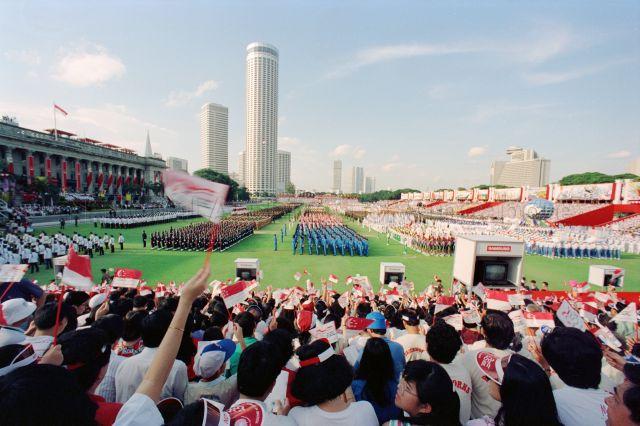 National Day Parade 1990 at the Padang - Spectators watching the parade.