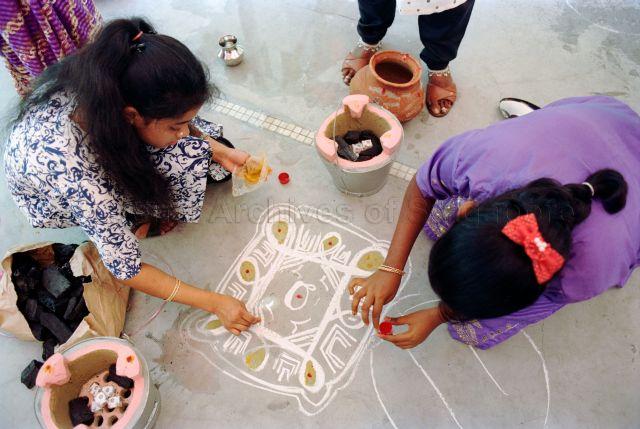 Pongal Celebration at Hong Kah Community Centre - Indian ladies preparing for the Pongal festival.