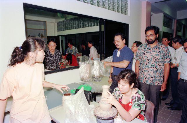 Visit by Malaysian journalists to Changkat Community Centre - Malaysian journalists visiting a pottery class.