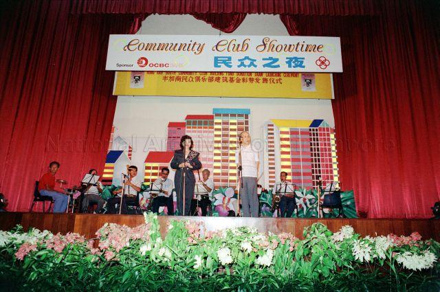 Hong Kah South Community Club Building Fund Donation Draw Launching Ceremony / Community Club Showtime - Song performance on stage.