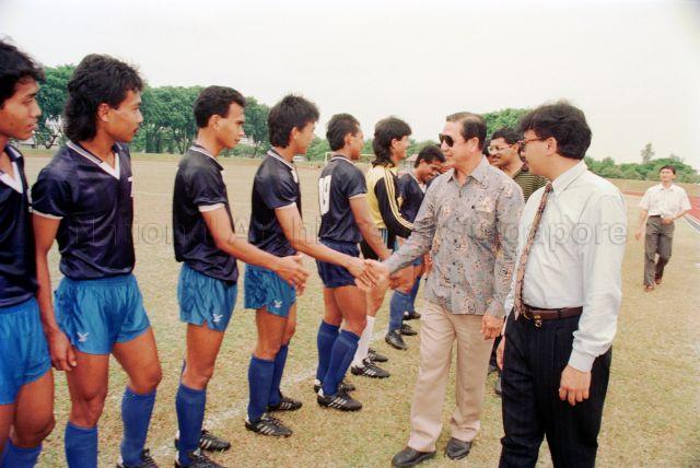Singapore-Indonesia Youth Sports Exchange 1991 at People's Association Headquarters - Officials shaking hands with the Indonesian team.