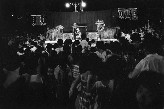 Opening of Duxton Plain Park - Spectators watching the performance on stage