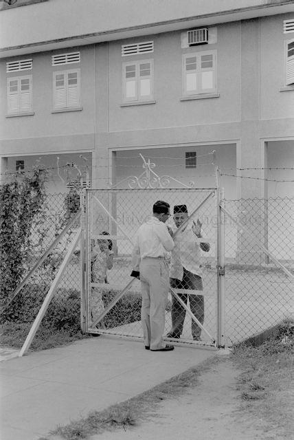 Boycott of examinations at Geylang Malay Girls Vocational School - School officials attending to members of public at the school gate