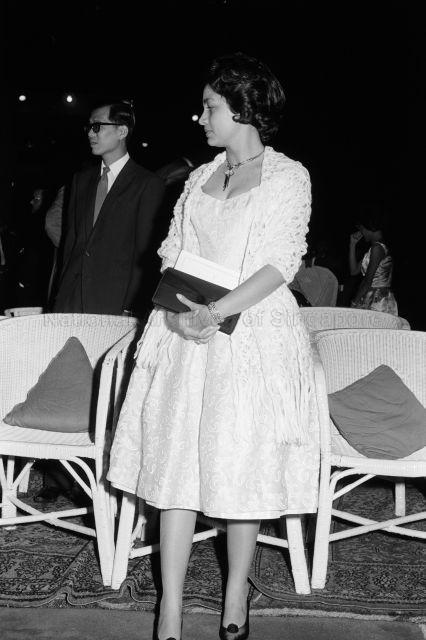 Visit to Singapore - Princess Norodom Monineath of Cambodia watching lion dance performance at the Istana Negara, with Minister for Home Affairs Ong Pang Boon in the background