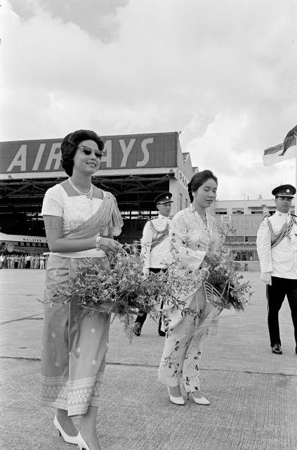 Visit to Singapore - Princess Norodom Monineath of Cambodia presented with bouquet of flowers along with Puan Noor Aishah