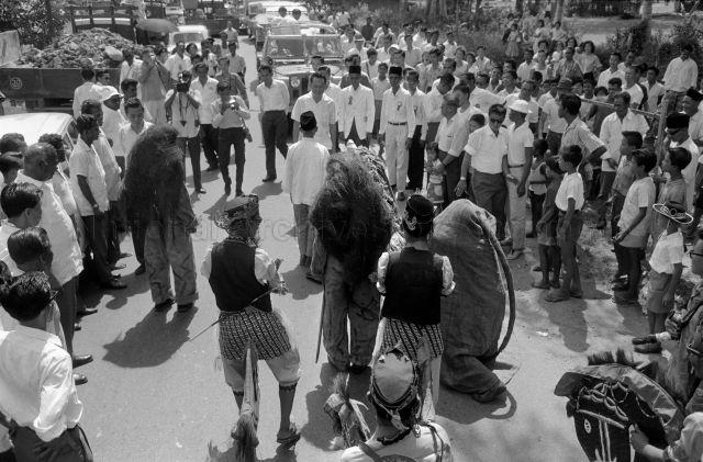 Visit to Pasir Panjang Constituency - Malay "kuda kepang" performance welcoming the arrival of Prime Minister Lee Kuan Yew