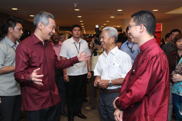 Prime Minister Lee Hsien Loong with his old Singapore Armed Forces' friend Omar Haron at the reception during National Day Rally at University Cultural Centre, National University of Singapore in Kent Ridge