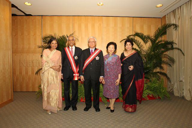 Group photograph of President and Mrs Tony Tan Keng Yam with recipient of the Order of Nila Utama (First Class), Chairman of Council of Presidential Advisers J Y Pillay, and his family members during investiture of National Day awards at University Cultural Centre, National University of Singapore in Kent Ridge