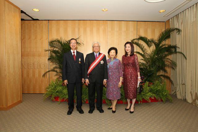 Group photograph of President and Mrs Tony Tan Keng Yam with recipient of Meritorious Service Medal, President of Singapore Medical Council Professor Tan Ser Kiat, and his wife during investiture of National Day awards at University Cultural Centre, National University of Singapore in Kent Ridge