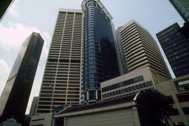 View of buildings near Raffles Place, including Standard Chartered Bank building (left, now known as 6 Battery Road) and Shell Tower (second from left, also known as Singapore Land Tower)