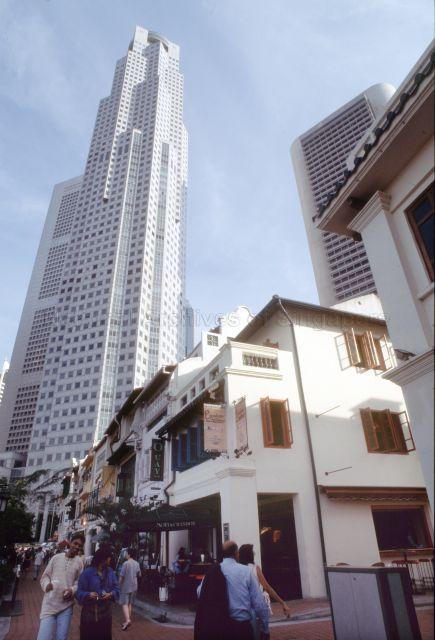 Shophouses at Boat Quay with United Overseas Bank (UOB) Plaza One towering in the background