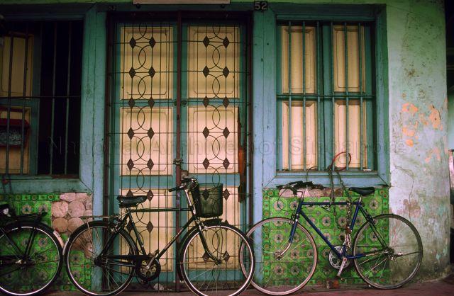 Bicycles in front of a shophouse