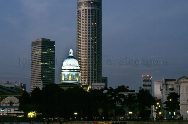 Night view of (from left) Raffles City, dome of Supreme Court and Westin Stamford hotel