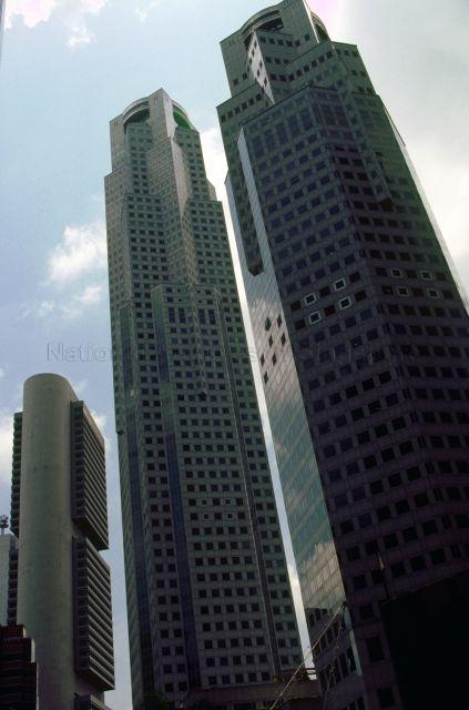 Oversea-Chinese Banking Corporation (OCBC) Centre (left) and the two towers of United Overseas Bank (UOB) Plaza at Raffles Place