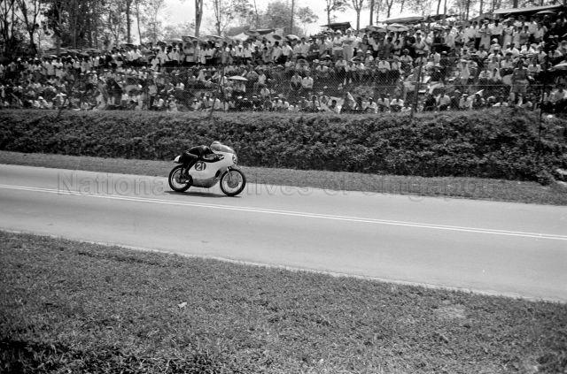 Japanese works rider Fumio Ito riding a Yamaha (number 21) during third Malaysia Grand Prix (also known as Malaysian Grand Prix) held at Upper Thomson Road, Singapore.