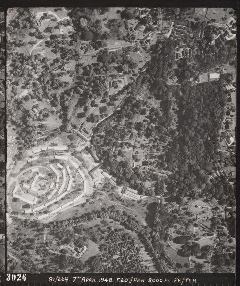 The Singapore Botanic Gardens (SBG) is on the right side of the photograph. The forested patch on the right is the SBG Rainforest. The oval-shaped open space just below the SBG Rainforest is the Bandstand, on the lower right of the photograph.