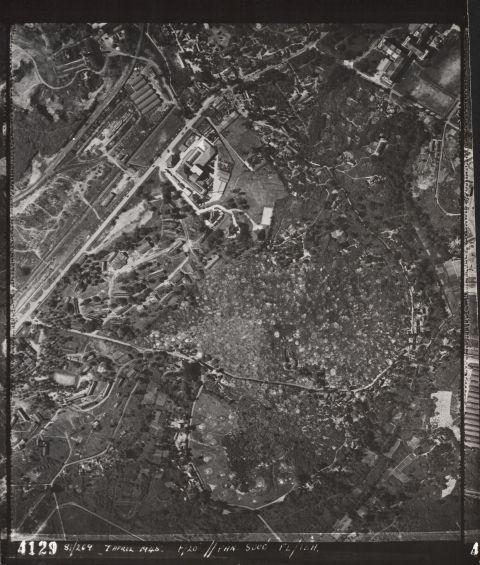 Aerial view of the Alexandra Road area, with north down, so best viewed rotated 180Â°. Then, Alexandra Road is the road running diagonally from the middle right edge of the photograph to the bottom edge. In the bottom right corner is Hock San Brickworks and part of its quarry. Between the brickworks and Alexandra Road are the ABC railway sidings. The large factory on Alexandra Road is the Archipelago (Anchor) Brewery. Above and left of Alexandra Road is the Chinese cemetery at the Bukit Pandan Kechil / Stirling Road area. Note that this photograph predates the construction of Jalan Bukit Merah, which later crossed the bottom of the area seen.