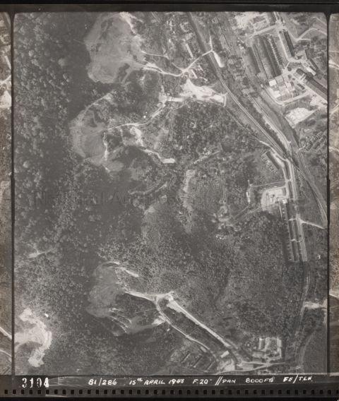 The Singapore Quarry (top) beside Upper Bukit Timah Road 8ms, with the KTM Railway line running alongside. Hume Industries buildings at top right. Quarry at bottom of photo is the Dairy Farm Quarry. The railway truss bridge crosses Upper Bukit Timah Road (at middle right) beside the row of buildings that would become Rail Mall today.