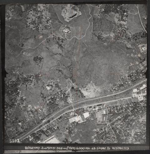 Centre right of photo is the summit of Bukit Panjang Hill. The quarry at top centre is Lian Hup Quarry. The road running at bottom of photo is 10ms Upper Bukit Timah Road with the KTM railway line running alongside. The cluster of large buildings at bottom right are the factories of Nanyang Shoe Company.
