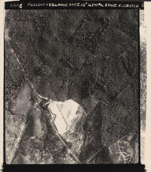 The Sin Seng Granite Quarry at Rifle Range Road, Bukit Timah. Bottom left is the Rifle Range. North is to the top of the photograph.<br />The cleared area (white area) with an angular shape is the Murnane Reservoir in construction. Sin Seng granite quarry would be more south (out of the photograph) of this location.